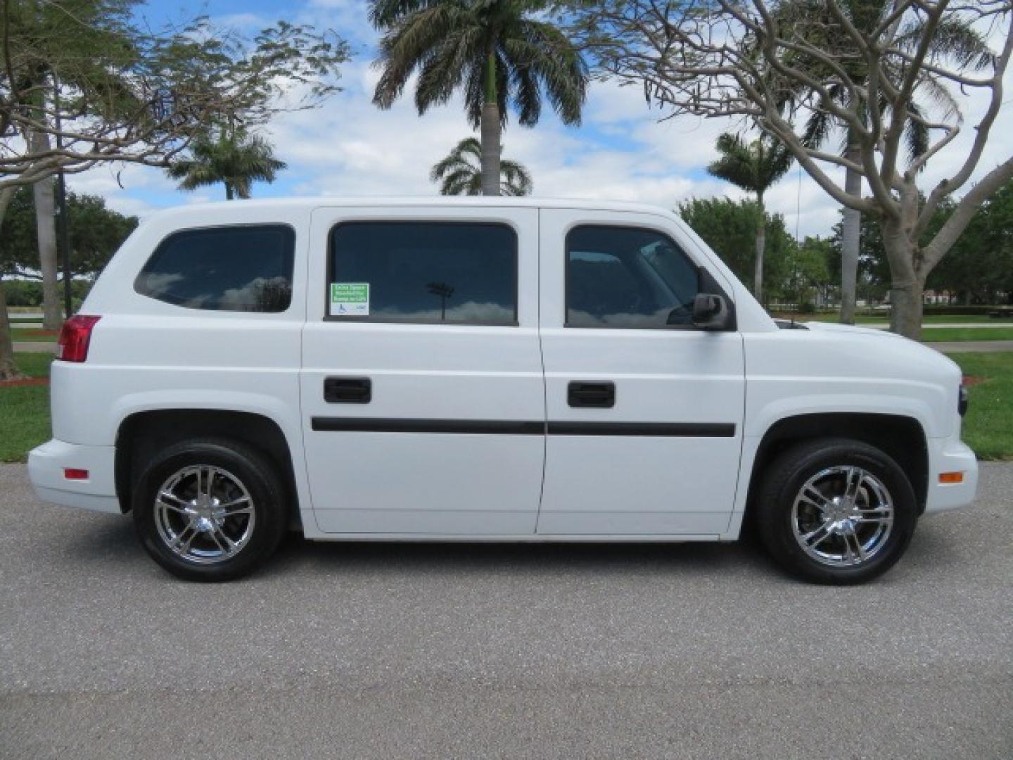 2012 White /Black with an 4.6L V8 engine, Automatic transmission, located at 4301 Oak Circle #19, Boca Raton, FL, 33431, (954) 561-2499, 26.388861, -80.084038 - You are looking at a Gorgeous 2012 Mobility Ventures MV1 Handicap Wheelchair Conversion Van with 64K Original Miles, 4.6L Ford V8, Bleack Leather Type Interior, Alloy Wheels, Power Side Entry Wheelchair Lift with Long Ramp and Short Ramp Function, Q Lock 150 EZ Lock, L-Track Tie Down System, Back Up - Photo#7